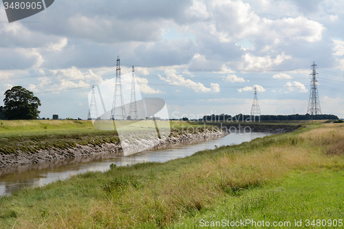 Image of Overhead power lines span the River Nene in Cambridgeshire