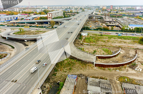 Image of Aerial view of highway interchange of modern urban city