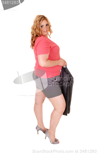 Image of Blond plus size woman in shorts.