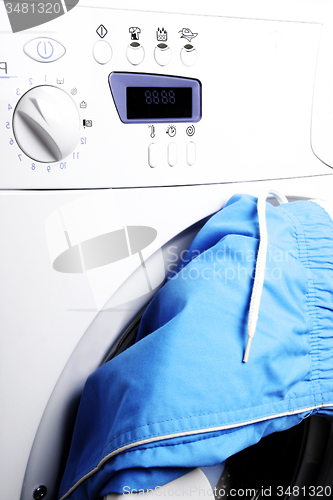 Image of Trousers and laundry.