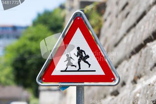 Image of Pedestrian danger sign - Red triangle safety traffic sign