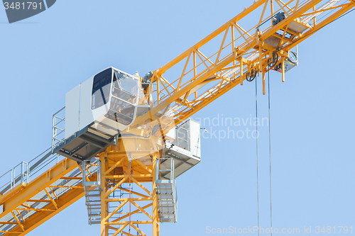 Image of Yellow crane and blue sky 