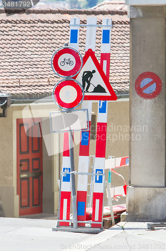 Image of Road signs in a street under reconstruction