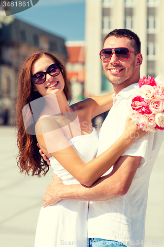 Image of smiling couple in city