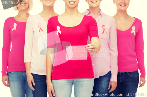 Image of close up of women with cancer awareness ribbons