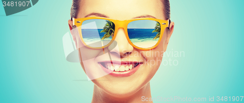 Image of happy teenage girl in sunglasses