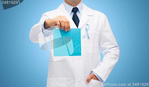 Image of doctor with prostate cancer awareness ribbon