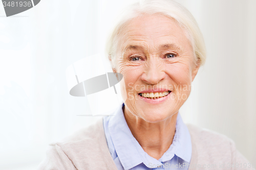 Image of happy senior woman face at home