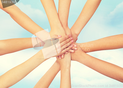 Image of close up of hands on top