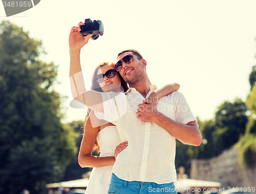 Image of smiling couple in city