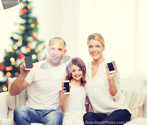 Image of happy family with smartphones
