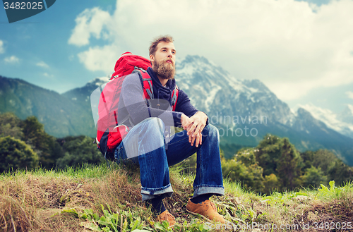 Image of man with backpack hiking