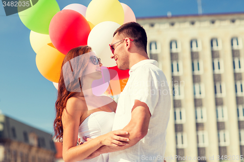 Image of smiling couple in city