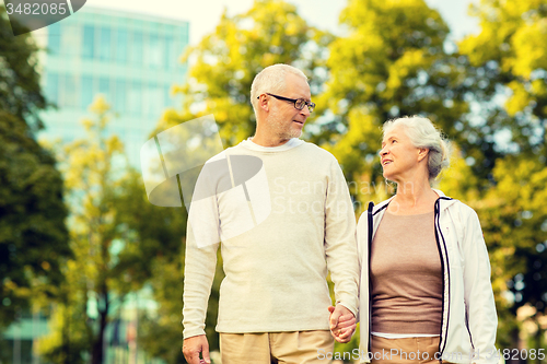 Image of senior couple in city park