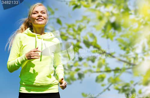 Image of woman jogging outdoors
