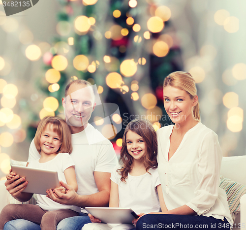 Image of happy family with tablet pc computers