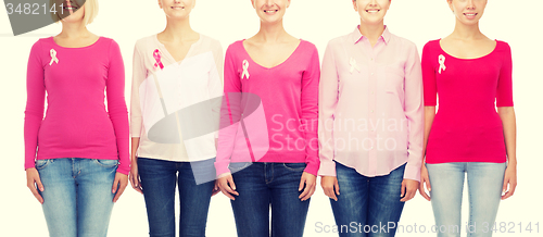 Image of close up of women with cancer awareness ribbons