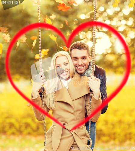 Image of romantic couple in the autumn park