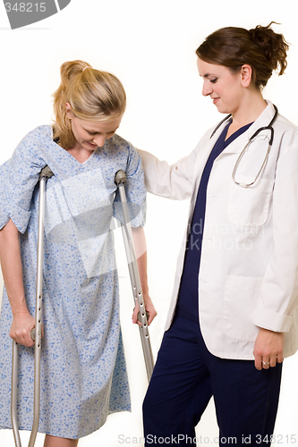 Image of Doctor helping patient