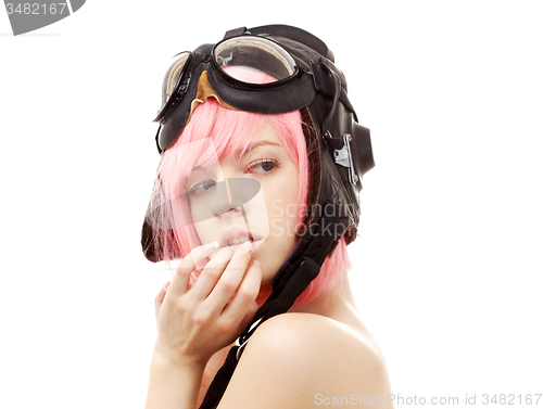 Image of topless pink hair girl in aviator helmet