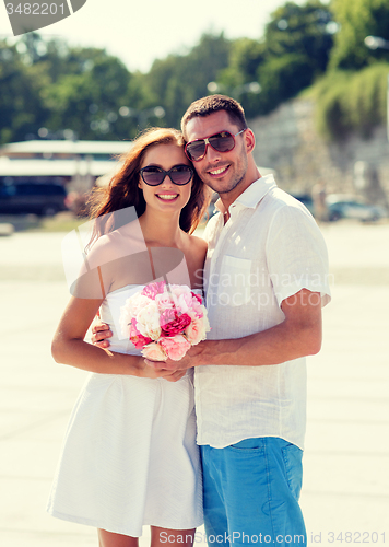 Image of smiling couple in city