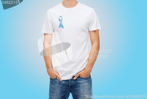 Image of man with blue prostate cancer awareness ribbon