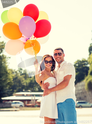 Image of smiling couple in city