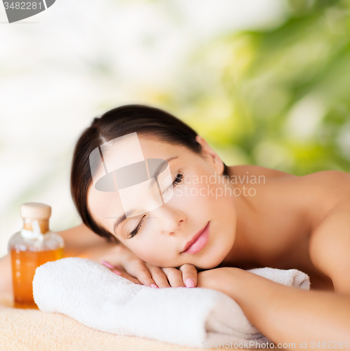 Image of happy woman in spa salon