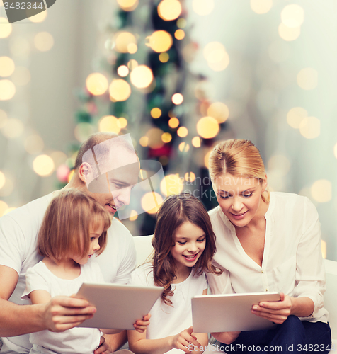 Image of happy family with tablet pc computers