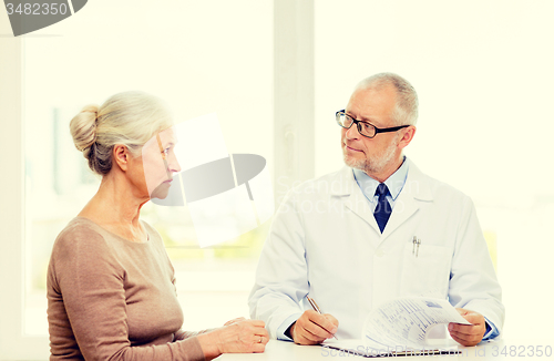 Image of senior woman and doctor meeting