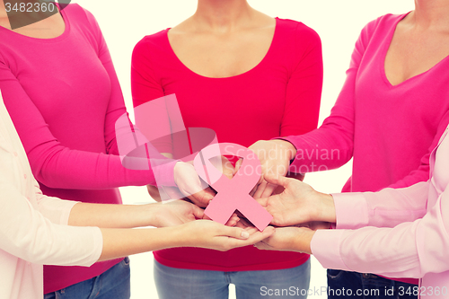 Image of close up of women with cancer awareness ribbons