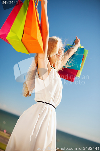 Image of woman with shopping bags
