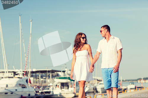 Image of smiling couple in city