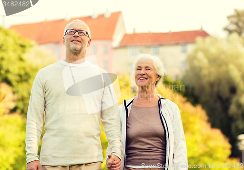 Image of senior couple in city park