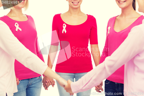 Image of close up of women with cancer awareness ribbons