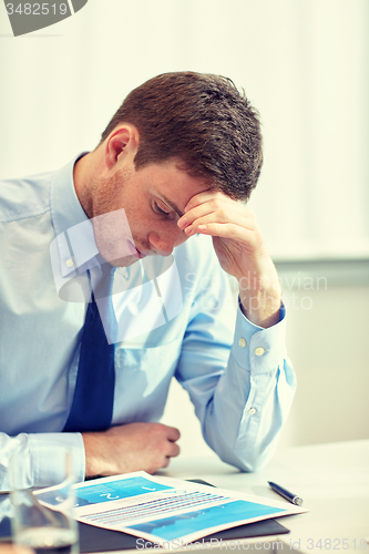 Image of businessman having problem in office