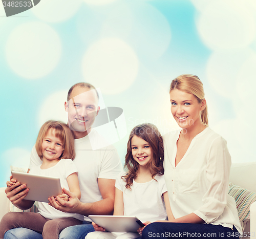 Image of happy family with tablet pc computers