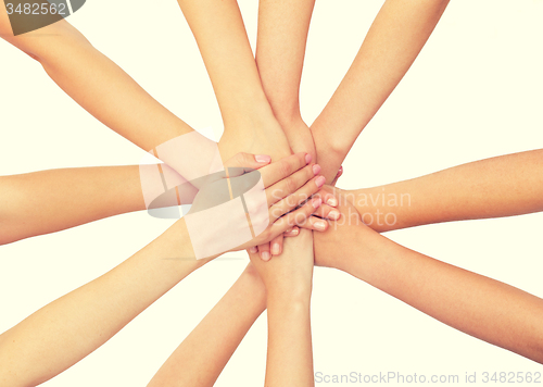 Image of close up of hands on top