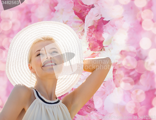 Image of beautiful woman enjoying summer outdoors