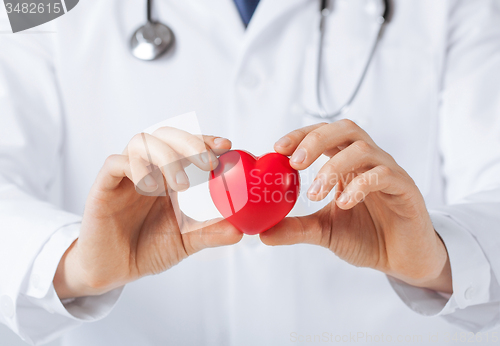 Image of man hands with heart