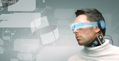 Image of man with futuristic glasses and sensors