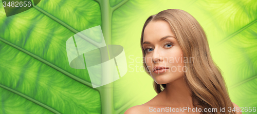 Image of beautiful woman face with long blond hair