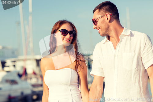 Image of smiling couple in city