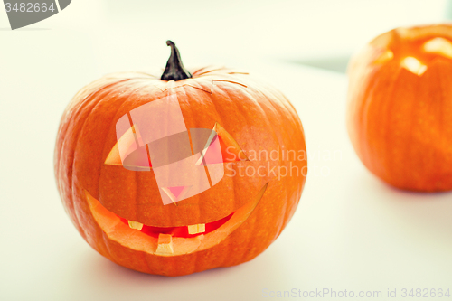 Image of close up of pumpkins on table