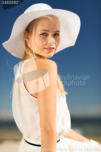 Image of beautiful woman enjoying summer outdoors