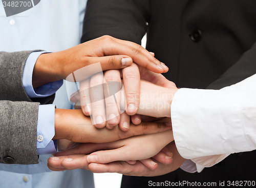 Image of group of businesspeople celebrating victory