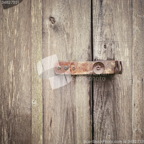 Image of wooden door with lock