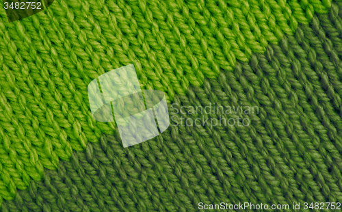 Image of Stockinette stitch in bright and moss green wool background
