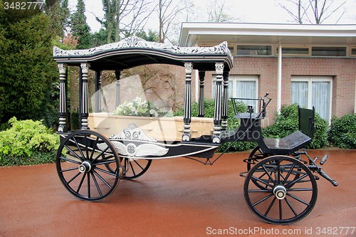 Image of Casket on a funeral carriage