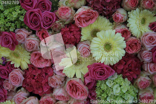 Image of Yellow and pink bridal flowers